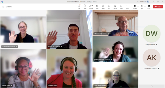 Screen shot of Teams meeting; seven people in a grid are waving at their cameras while two more people have cameras off.